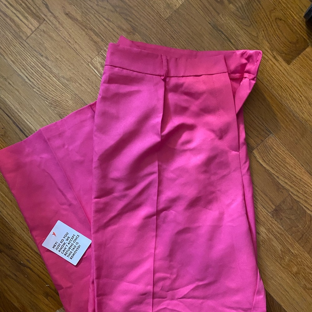 Hot pink pleated trousers